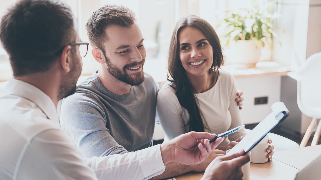 couple meeting with an insurance agent