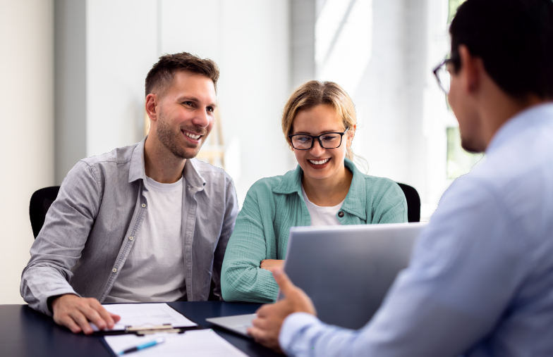 Young couple meeting with their insurance agent