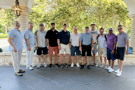 large group photo of agent trip golfers