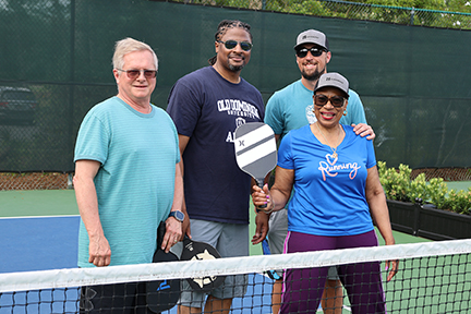 small group photo of pickleball players
