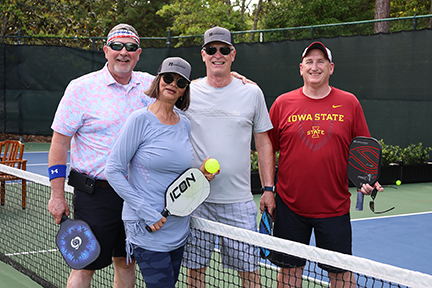 small group photo of pickleball players