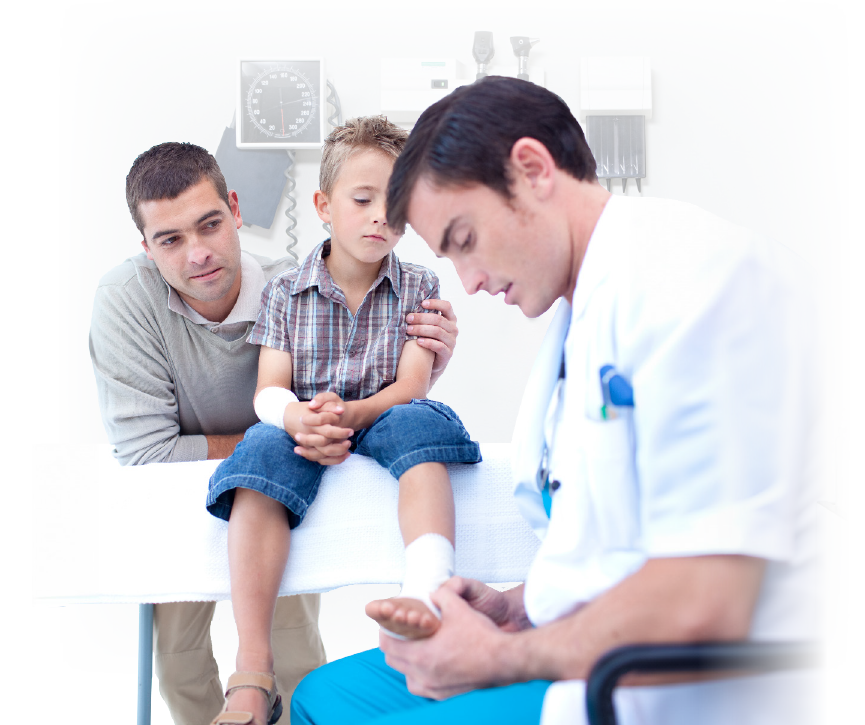 young boy and father with doctor