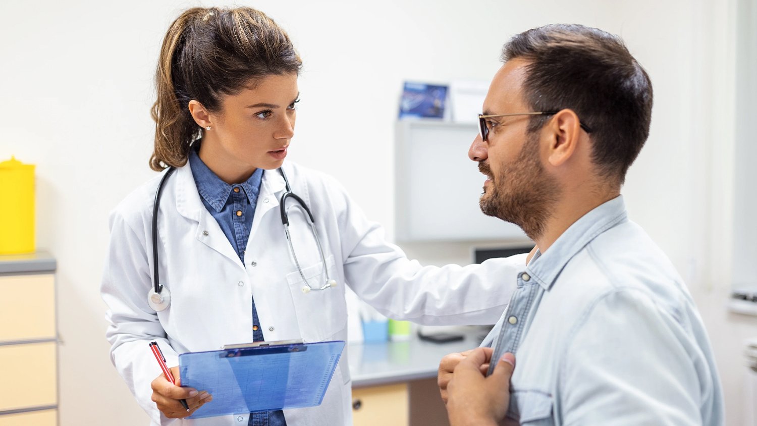 image of a doctor talking to her patient